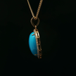 Yellow Gold Charm Pendant with Oval Turquoise Cabochon
