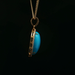 Yellow Gold Charm Pendant with Oval Turquoise Cabochon