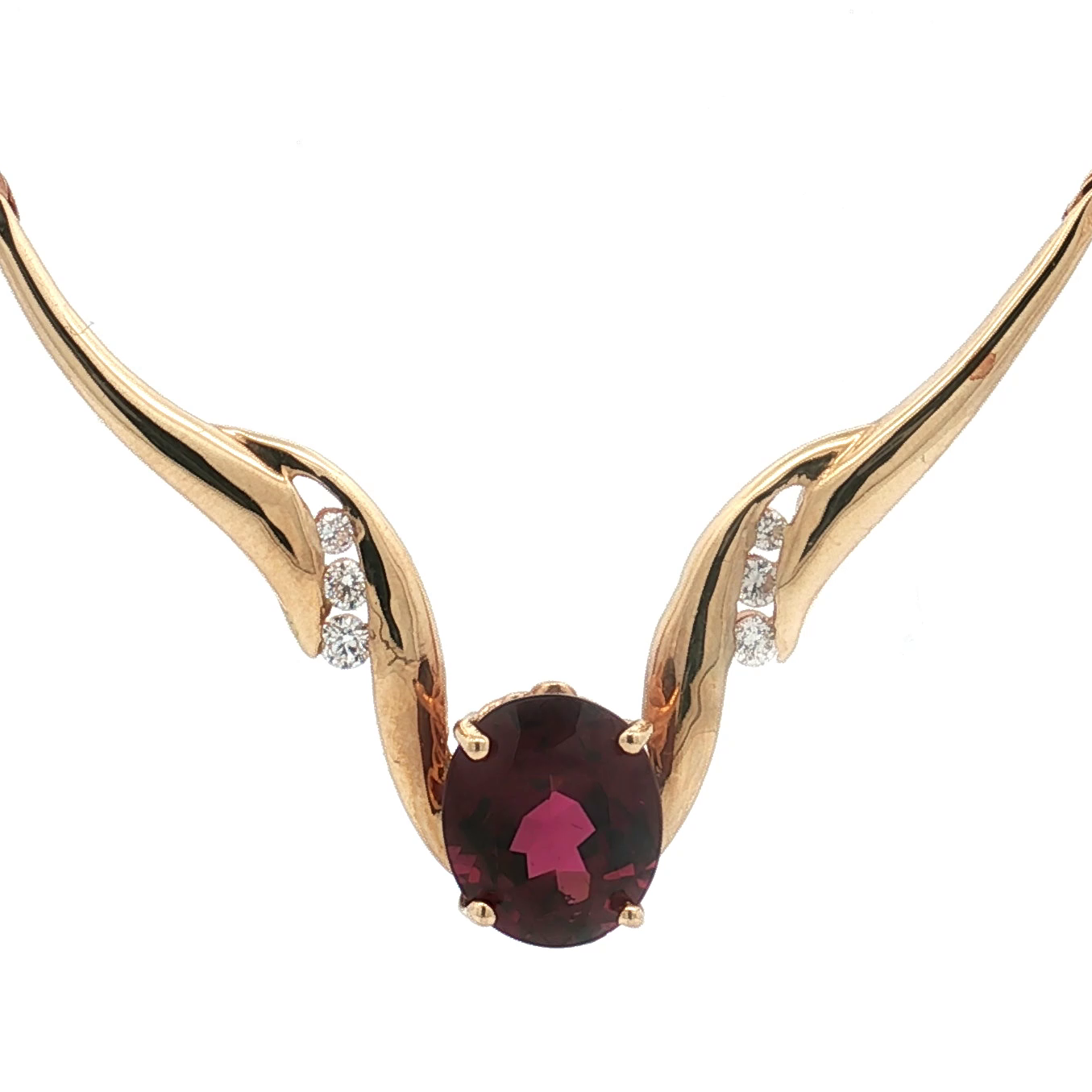 Gold necklace with a rhodolite garnet pendant on a white background